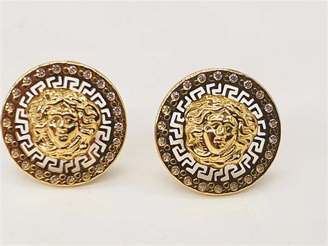 Pendientes Versace para hombre .